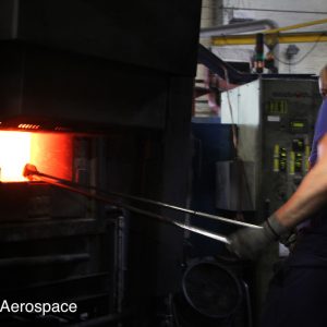 Removing components from a furnace ready for forging