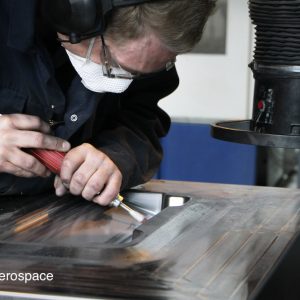 Highly-skilled tooling technician producing a die